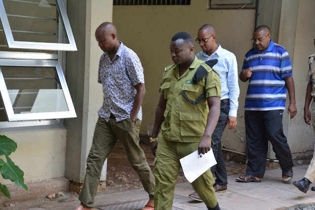 OFISA JESHI LA POLISI ,WAFANYABIASHARA WATATU KORTINI WAKIKABILIWA NA MASHTAKA MATATU LIKIWEMO LA KULISABISHIA JESHI LA POLISI HASARA ZAIDI YASH. MILIONI 798.7